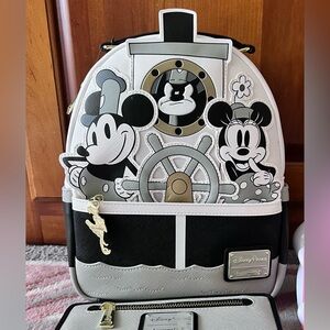 Loungefly . NWT Steamboat Willie backpack and matching wallet.